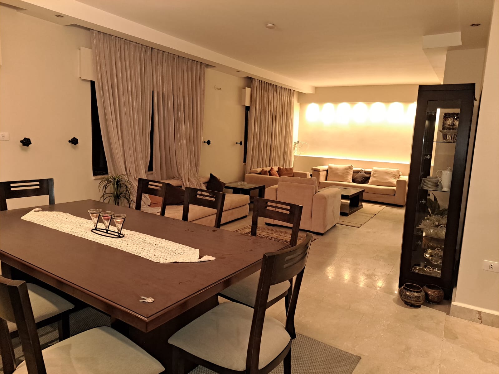 A fourth-floor apartment with a roof, available for rent or sale in Abdoun. - Property Image 2